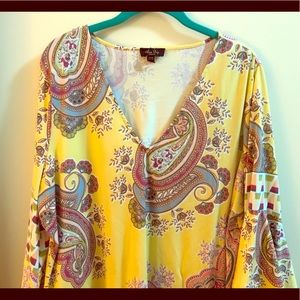 Bright yellow blouse with large sleeves